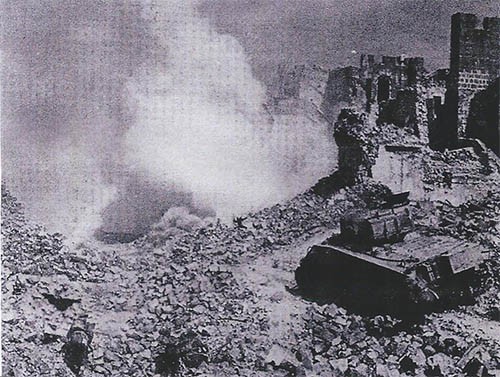 a New Zealand tank in the ruins at Castle Hill near Cassino